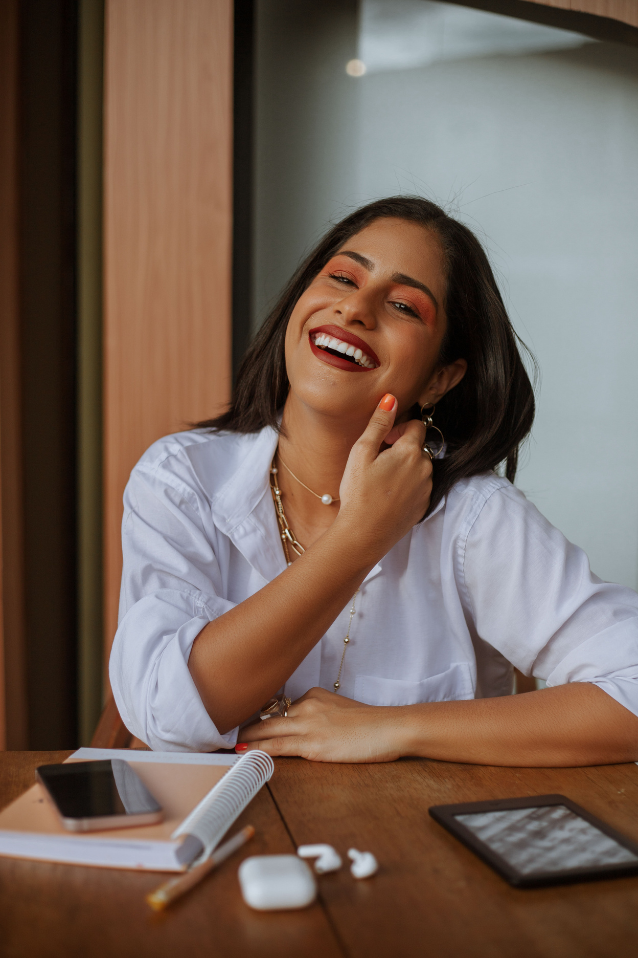 Laughing Woman in White Shirt